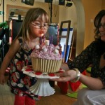 abbie blowing cake